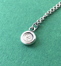 Load image into Gallery viewer, Shamrock wax seal necklace. Irish jewelry, lucky charm necklace.  Tiny shamrock pendant from Ireland