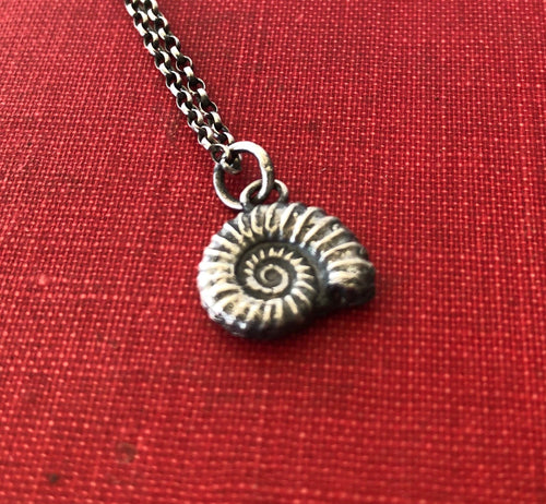 Ammonite fossil, sterling silver cast.  antique wax letter seal 'add on'.