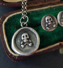 Load image into Gallery viewer, Silver skull and crossbones pendant. Antique wax seal jewelry. Memento Mori pendant.