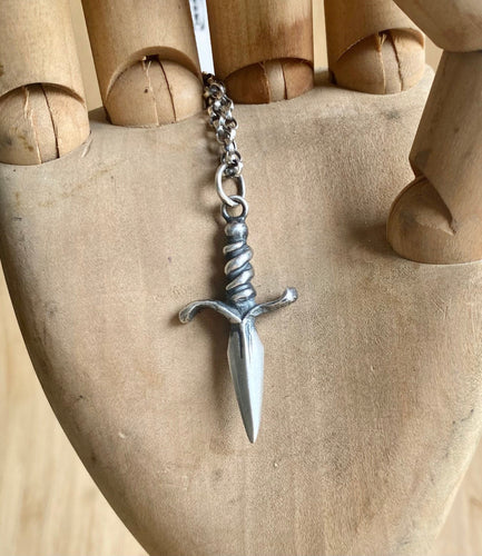 Solid sterling silver dagger.  Symbol of betrayal, loss, danger. Protection, sacrifice and bravery.