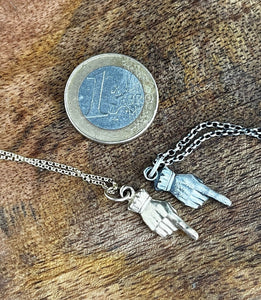Adorable and quirky Victorian hand necklace in sterling silver.