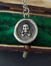 Load image into Gallery viewer, Silver skull and crossbones pendant. Antique wax seal jewelry. Memento Mori pendant.