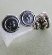 Load image into Gallery viewer, Tiny Sterling Silver, antique Wax seal earrings. Lucky shamrock emblem of Ireland