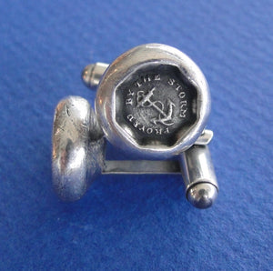Proved by the Storm cufflinks .... antique wax seal, sterling silver, survivor, succeed, successful emblem