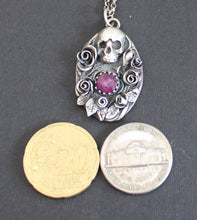 Load image into Gallery viewer, Ruby Skull and flower pendant.