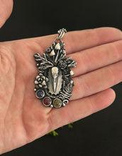 Load image into Gallery viewer, Crow skull, vesuvianite, kyanite and ruby pendant With extendable chain