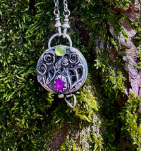 Load image into Gallery viewer, Duality locket, today we bloom, tomorrow we die.  Sterling silver with ruby and vesuvianite.