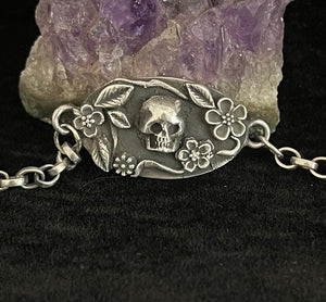 Skull and flower bracelet.  Sterling silver.