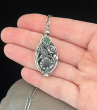 Load image into Gallery viewer, Tourmaline and sapphire duality  locket.  Today we bloom tomorrow we die.