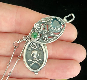 Tourmaline and sapphire duality  locket.  Today we bloom tomorrow we die.