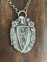 Load image into Gallery viewer, Sterling Skeleton pendant with clear Himalayan quartz.