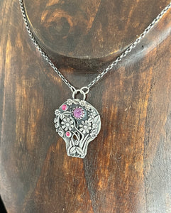 Hieronymus Bosch inspired skull.  With flowers and rubies. Sterling silver handmade.