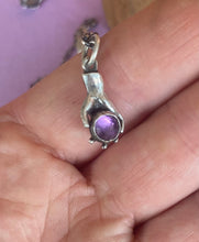 Load image into Gallery viewer, Hand pendant holding a faceted amethyst. Sterling silver handmade stone set pendant.