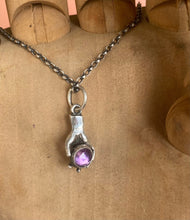 Load image into Gallery viewer, Hand pendant holding a faceted amethyst. Sterling silver handmade stone set pendant.