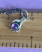 Load image into Gallery viewer, Hand pendant holding a faceted amethyst. Sterling silver handmade stone set pendant.