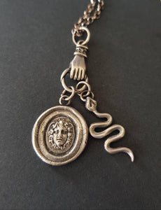 Medusa, snake and hand necklace. Female warrior....Sterling silver with long belcher chain. Handmade medusa necklace