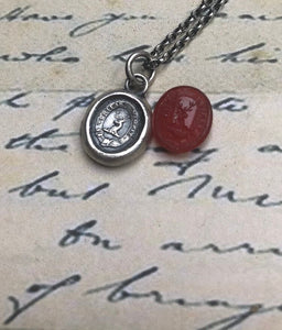 Vincit veritas, truth prevails. Antique wax letter seal pendant. Sterling silver victorian seal impression.