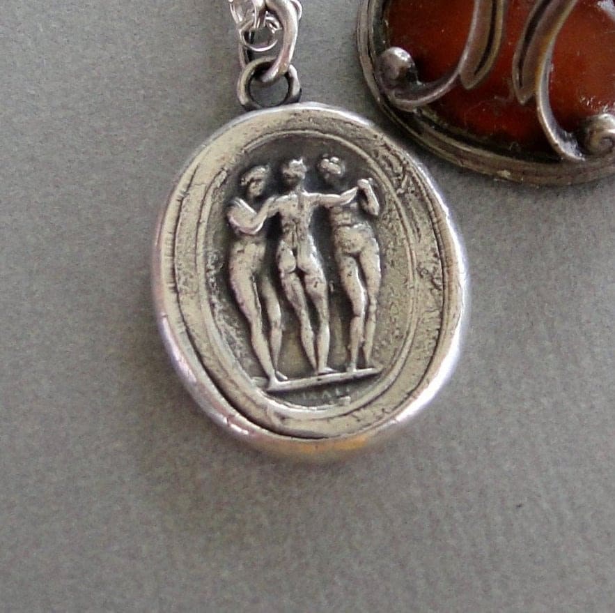 The Three Graces….. Charm, beauty and creativity.  Sterling silver, antiques wax seal impression.