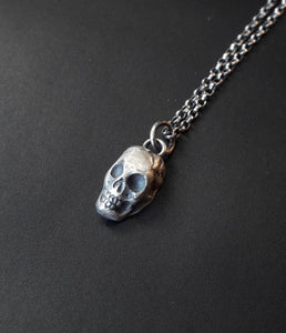 Tiny solid silver skull. Memento mori, add to your amulet. Small add on....