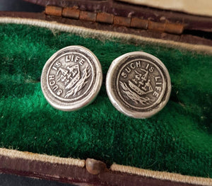 Such is life earrings, ship on rough seas. Antique wax letters seal studs.