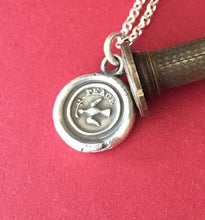 Load image into Gallery viewer, Peace pendant, Dove amulet, bird of peace, olive branch in its beak, sterling silver pendant. antique wax seal of bird of peace.