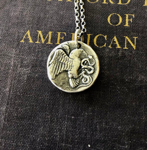 Eagle and Snake. Sterling silver  Antique Greek coin replica. Represents a huge struggle.