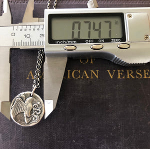 Eagle and Snake. Sterling silver  Antique Greek coin replica. Represents a huge struggle.