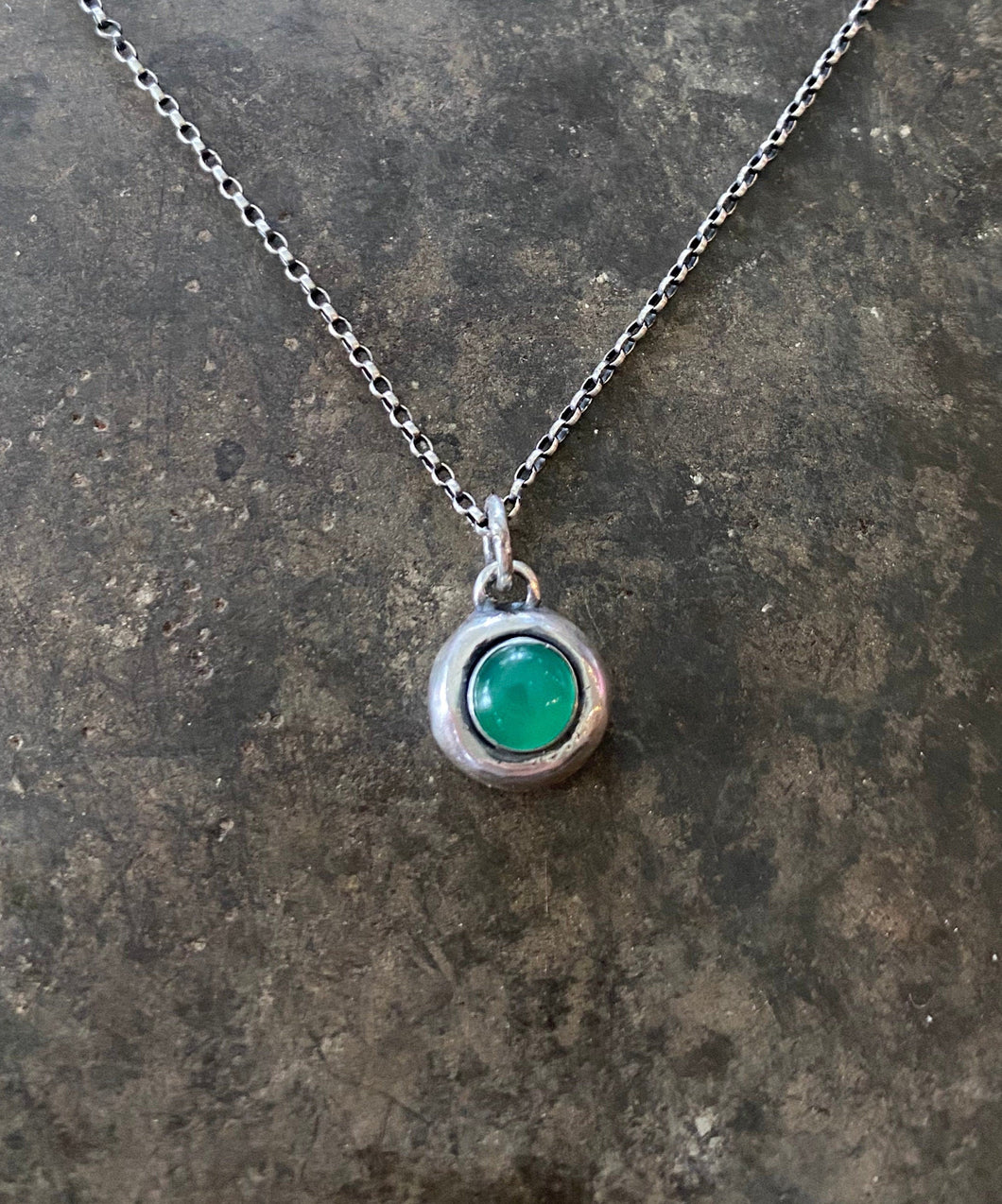 Green Onyx and sterling silver Add ON. add some colour to your meaningful necklace. 6mm green onyx set  in a nugget of sterling silver.
