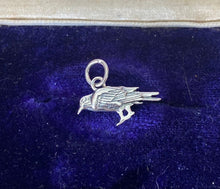 Load image into Gallery viewer, Itsy bitsy tiny raven.  Tiny crow add on to enhance your amulets. Sterling silver bird charm.