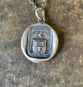 Courage, have to courage to succeed. Reap your rewards.  success. Lion and weath sheafs heraldry pendant. Antique wax seal impression.