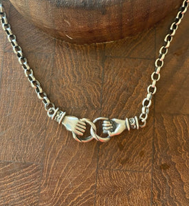 Clasped hands necklace.  Sterling silver, joined hands, 3mm sterling rolo chain in the length of your choosing