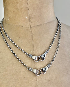 Clasped hands necklace.  Sterling silver, joined hands, 3mm sterling rolo chain in the length of your choosing