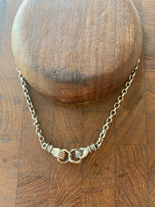 Clasped hands necklace.  Sterling silver, joined hands, 3mm sterling rolo chain in the length of your choosing