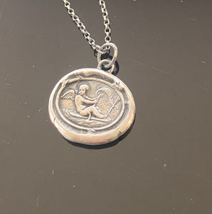 Love findeth the way…… Tassie seal with Cupid and rough seas. Sterling silver antique wax letter seal amulet. Handmade jewelry.