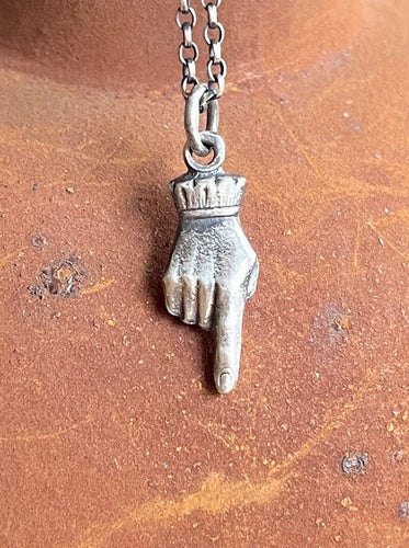 Adorable and quirky Victorian hand necklace in sterling silver.
