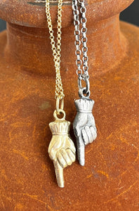 Adorable and quirky Victorian hand necklace in sterling silver.
