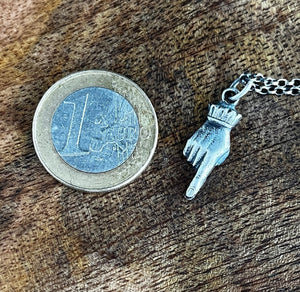 Adorable and quirky Victorian hand necklace in sterling silver.