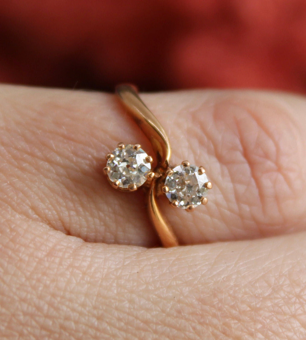 18ct Rose gold Toi et Moi Diamond ring.   .25ct each stone.  One modern stone one old cut stone. bright clean white diamonds.