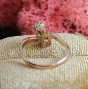 18ct Rose gold Toi et Moi Diamond ring.   .25ct each stone.  One modern stone one old cut stone. bright clean white diamonds.