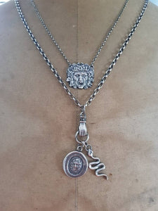Medusa, snake and hand necklace. Female warrior....Sterling silver with long belcher chain. Handmade medusa necklace