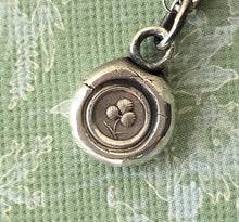 Load image into Gallery viewer, Shamrock wax seal necklace. Irish jewelry, lucky charm necklace.  Tiny shamrock pendant from Ireland