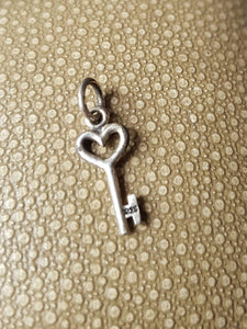 tiny key pendant.  sterling  &#39;add on&#39;  charm for your antique wax seal jewelry.