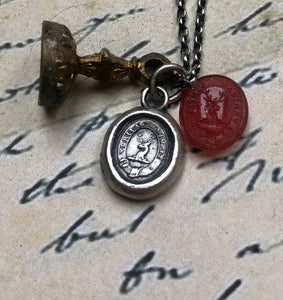 Vincit veritas, truth prevails. Antique wax letter seal pendant. Sterling silver victorian seal impression.