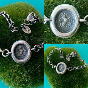 Sterling silver &#39;Valiant&#39; lion bracelet. Antique wax letter seal impression