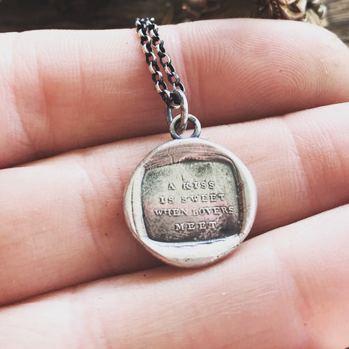 A kiss is sweet when lovers meet.  antique wax seal jewellery. seal jewelry.  handmade sterling pendant. meaningful gift for lover.