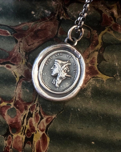 Trust, but be careful of whom you trust”.  “Fide sed cui vide”. Beware of people who are deceitful.  Georgian Tassie seal pendant.