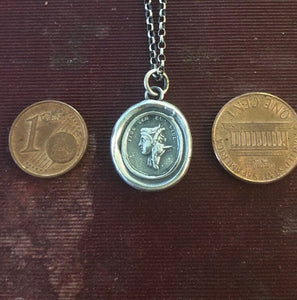 Trust, but be careful of whom you trust”.  “Fide sed cui vide”. Beware of people who are deceitful.  Georgian Tassie seal pendant.