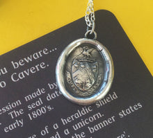 Load image into Gallery viewer, Sterling antique wax letter seal. Wonderful  Heraldry seal with swans, latin motto.  I bid you beware.  Caution, statement pendant.