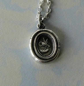 Pelican in her piety, parenthood necklace.  Family pendant, mother nurturing her young. Silver Mother or father gift,  chicks in a nest.