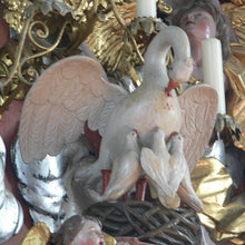 Load image into Gallery viewer, Pelican in her piety, parenthood necklace.  Family pendant, mother nurturing her young. Silver Mother or father gift,  chicks in a nest.